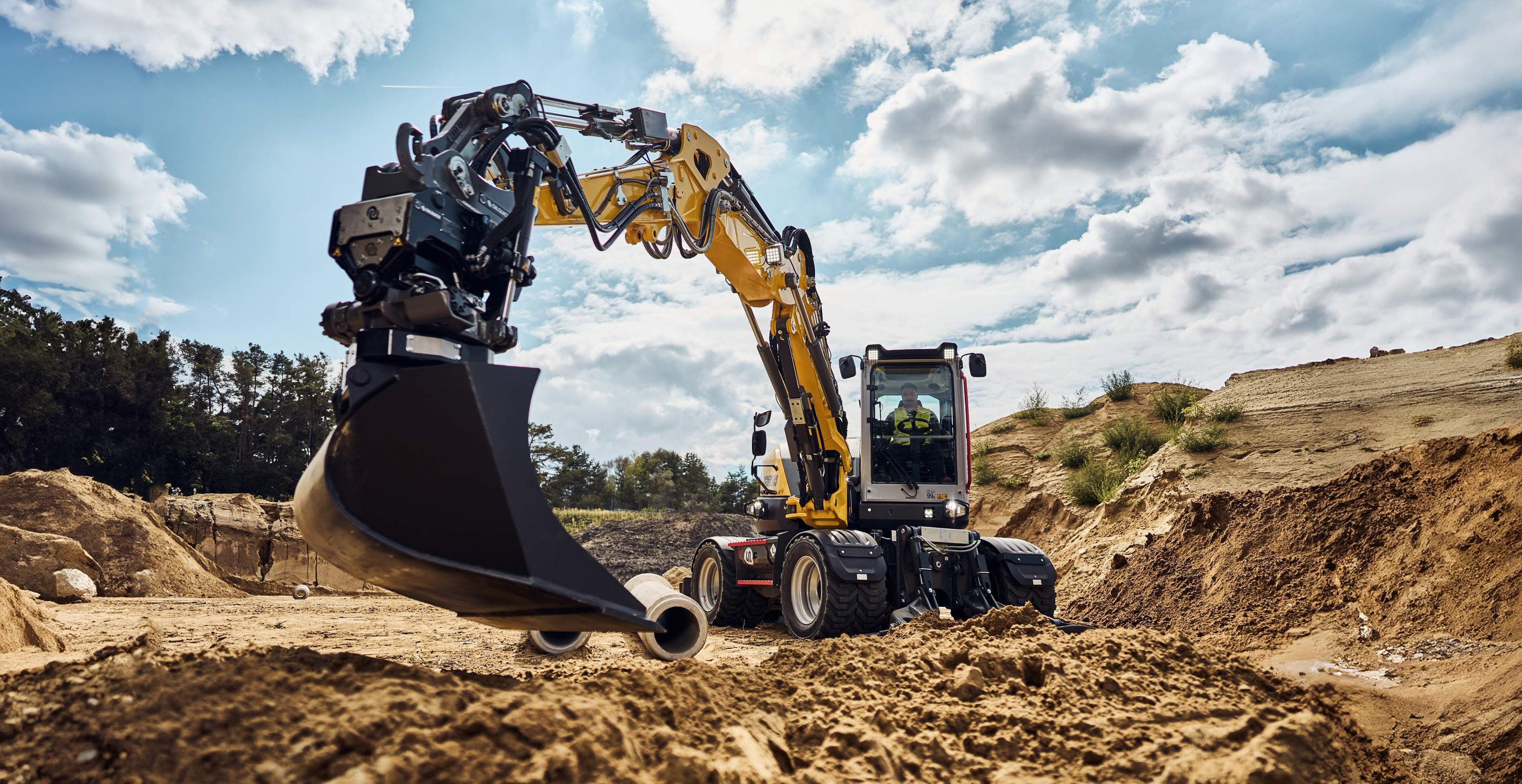 excavator EW100 in action